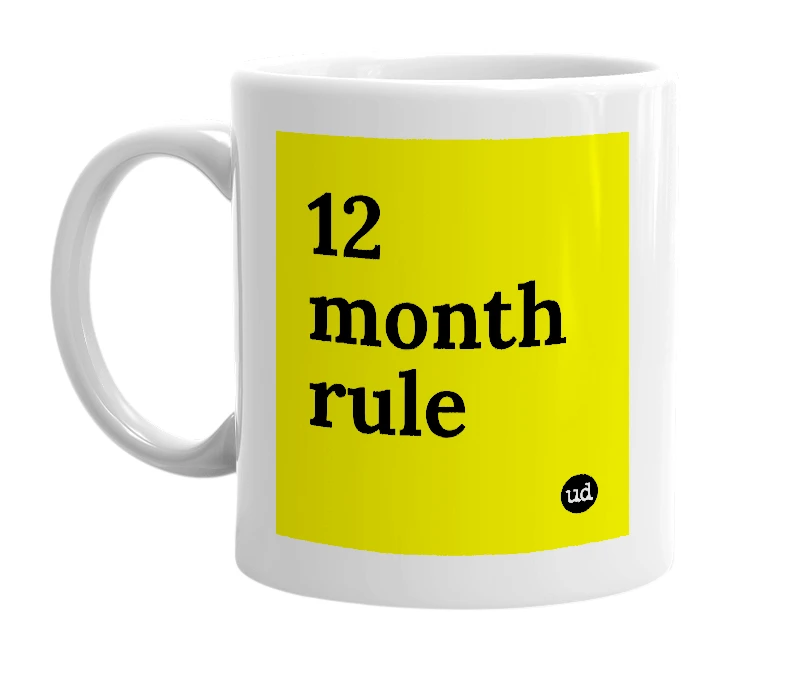 White mug with '12 month rule' in bold black letters