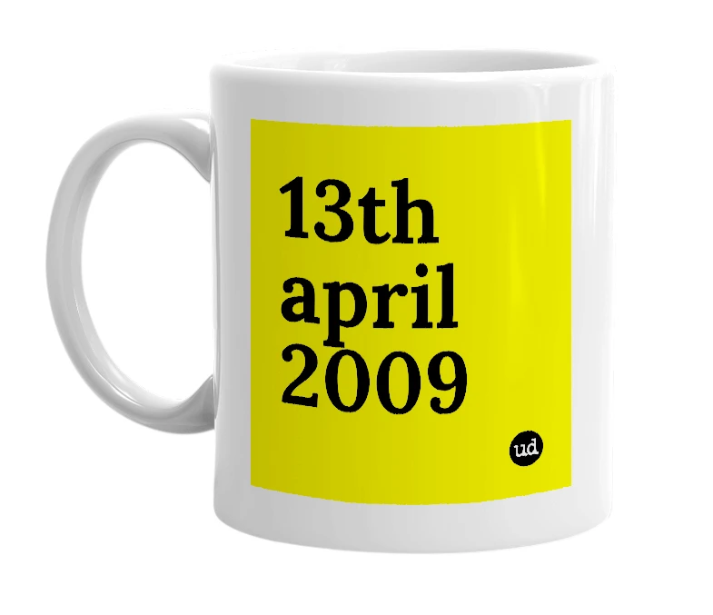White mug with '13th april 2009' in bold black letters
