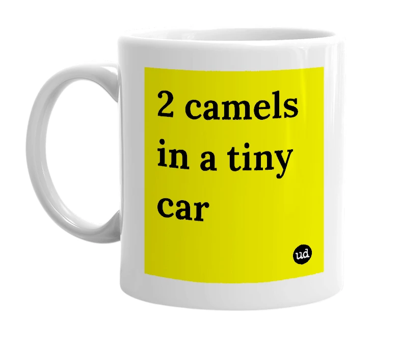 White mug with '2 camels in a tiny car' in bold black letters