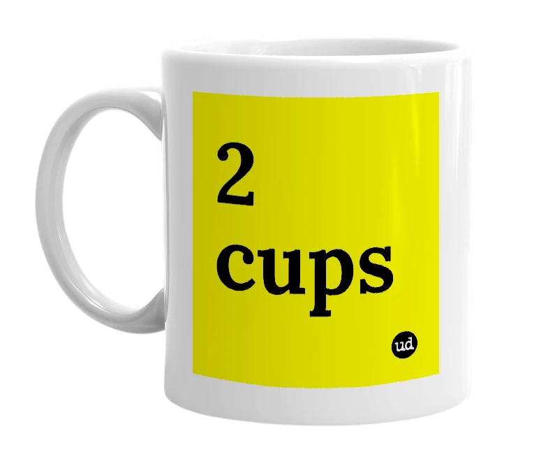 White mug with '2 cups' in bold black letters