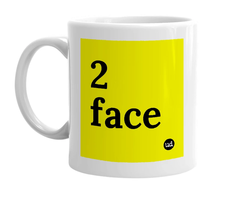White mug with '2 face' in bold black letters