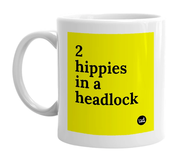 White mug with '2 hippies in a headlock' in bold black letters