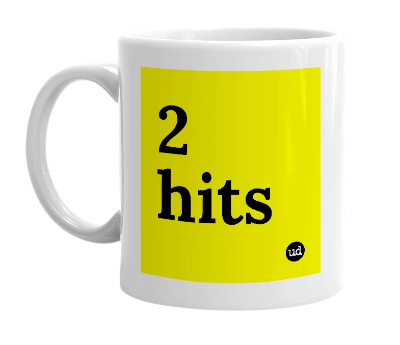 White mug with '2 hits' in bold black letters