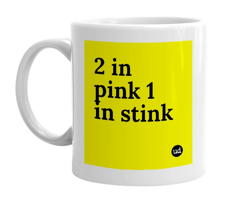 White mug with '2 in pink 1 in stink' in bold black letters