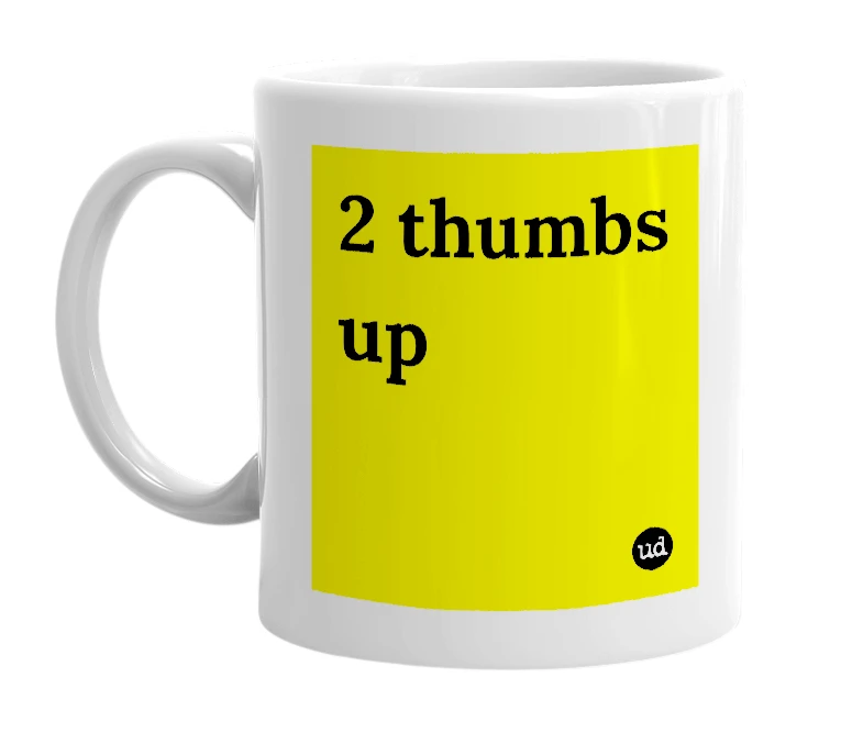 White mug with '2 thumbs up' in bold black letters