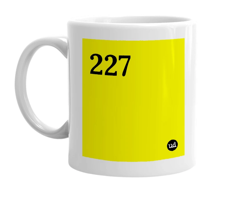 White mug with '227' in bold black letters