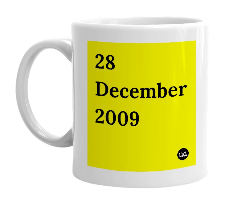 White mug with '28 December 2009' in bold black letters