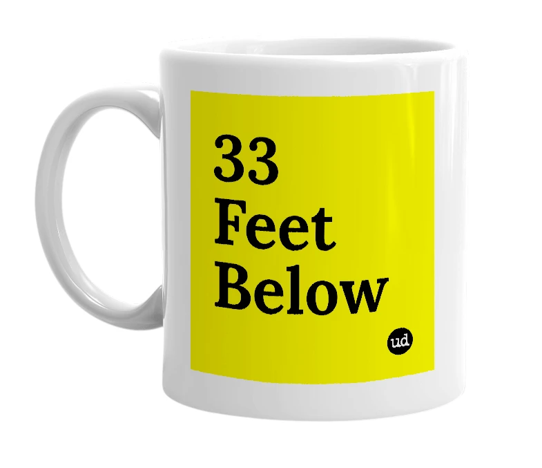 White mug with '33 Feet Below' in bold black letters