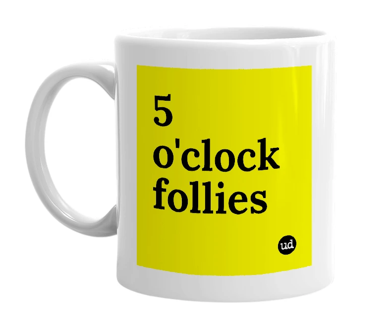 White mug with '5 o'clock follies' in bold black letters