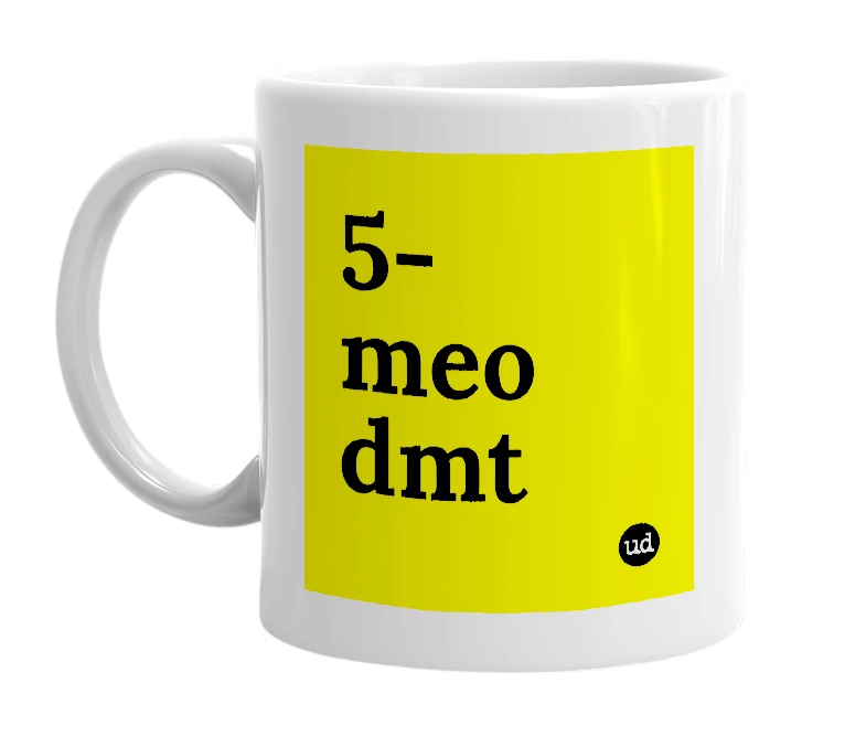 White mug with '5-meo dmt' in bold black letters