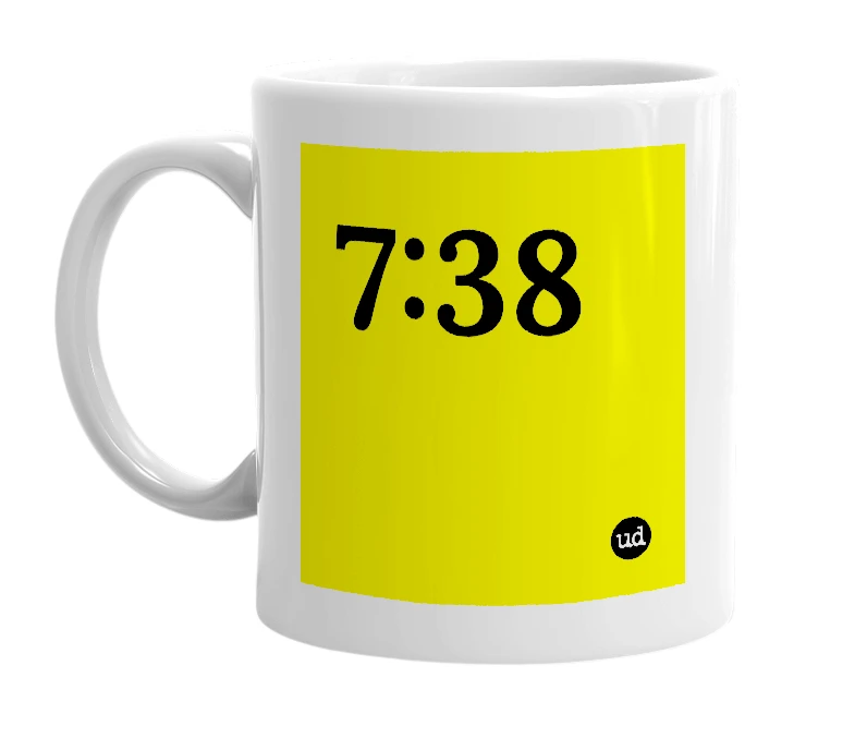 White mug with '7:38' in bold black letters