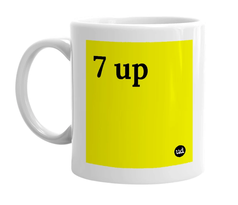 White mug with '7 up' in bold black letters