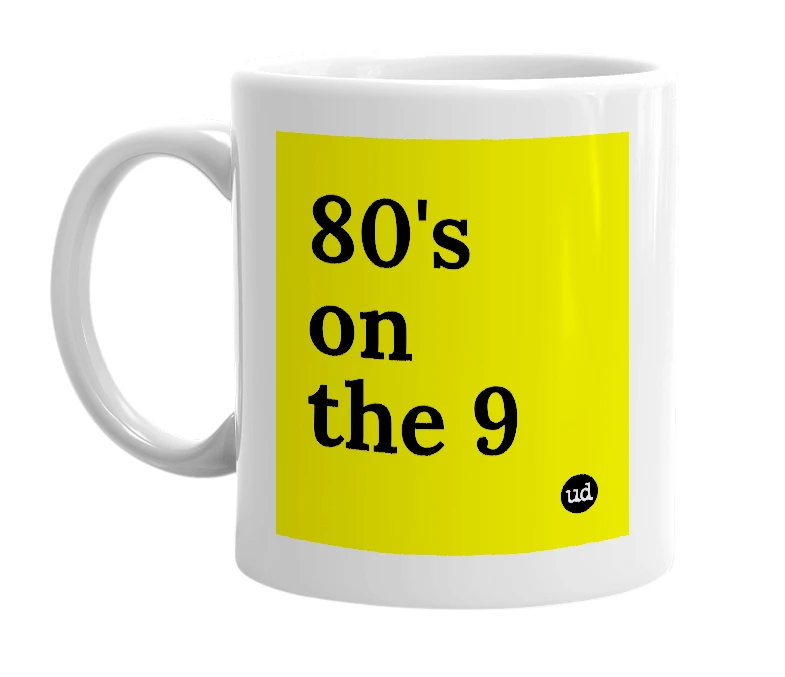 White mug with '80's on the 9' in bold black letters