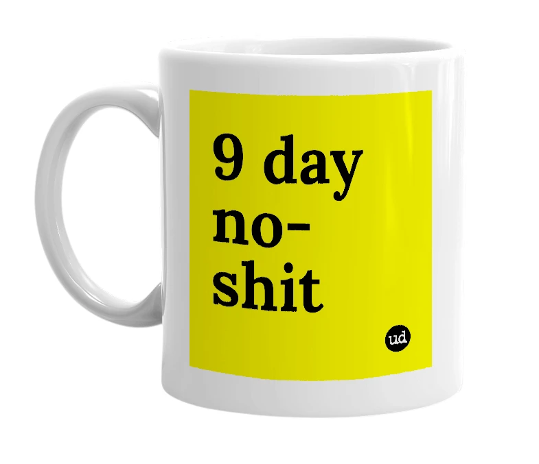 White mug with '9 day no-shit' in bold black letters