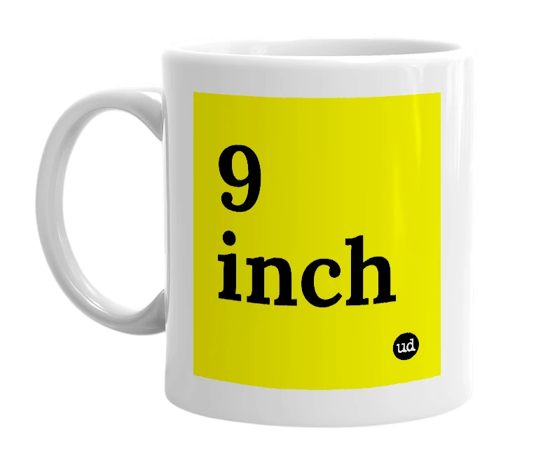 White mug with '9 inch' in bold black letters