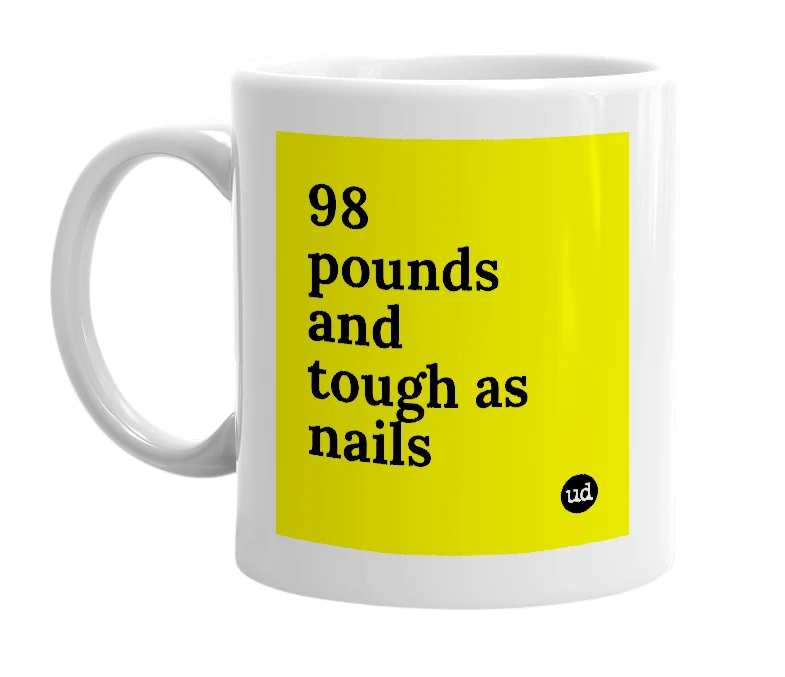 White mug with '98 pounds and tough as nails' in bold black letters