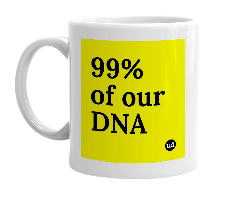 White mug with '99% of our DNA' in bold black letters