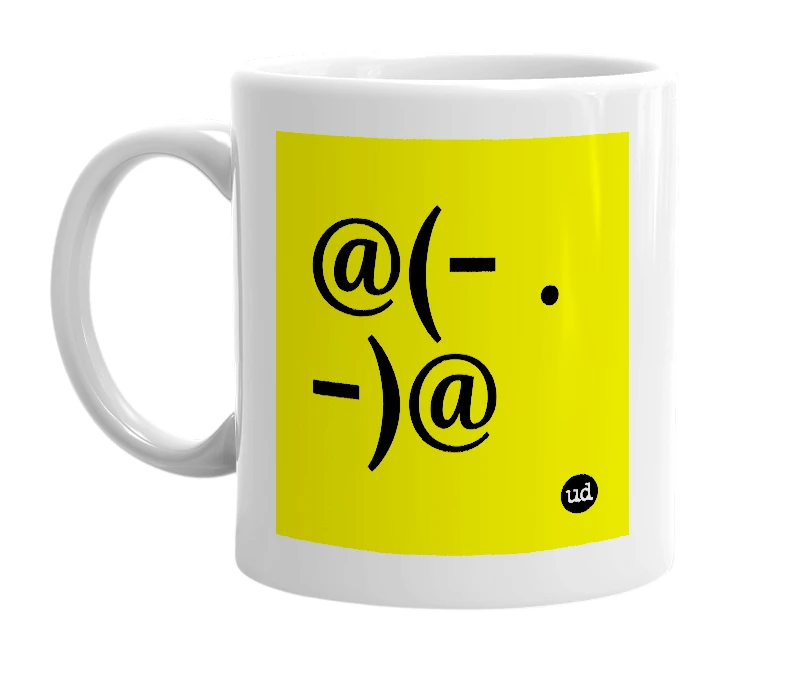 White mug with '@(- . -)@' in bold black letters