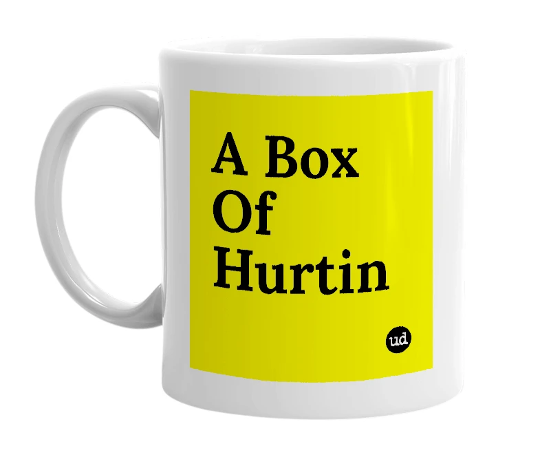 White mug with 'A Box Of Hurtin' in bold black letters