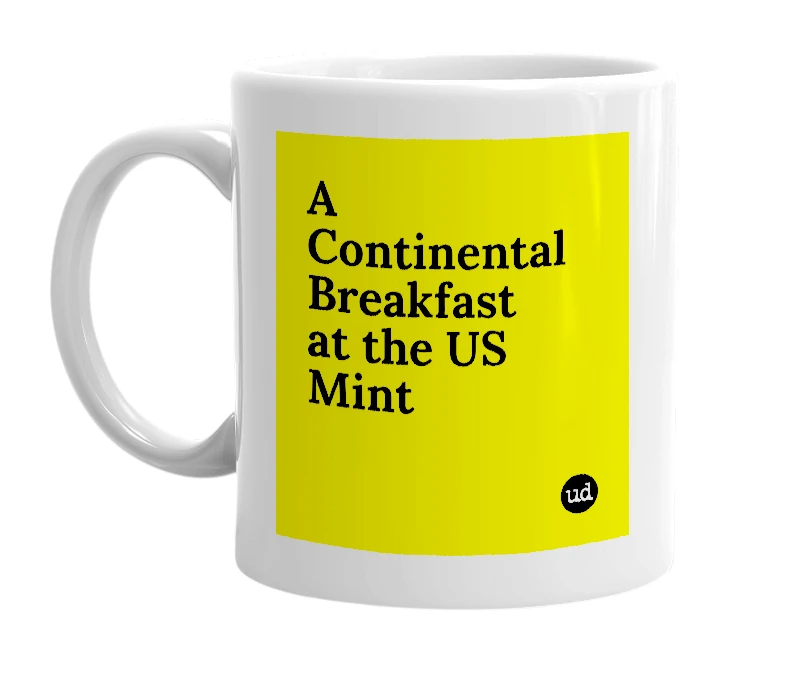 White mug with 'A Continental Breakfast at the US Mint' in bold black letters