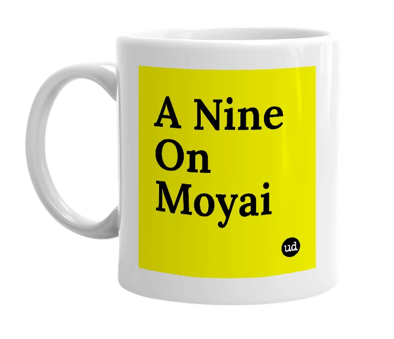 White mug with 'A Nine On Moyai' in bold black letters