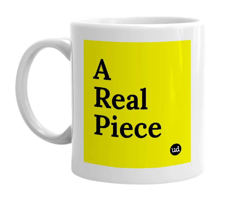 White mug with 'A Real Piece' in bold black letters