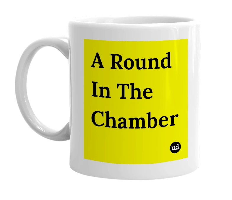 White mug with 'A Round In The Chamber' in bold black letters