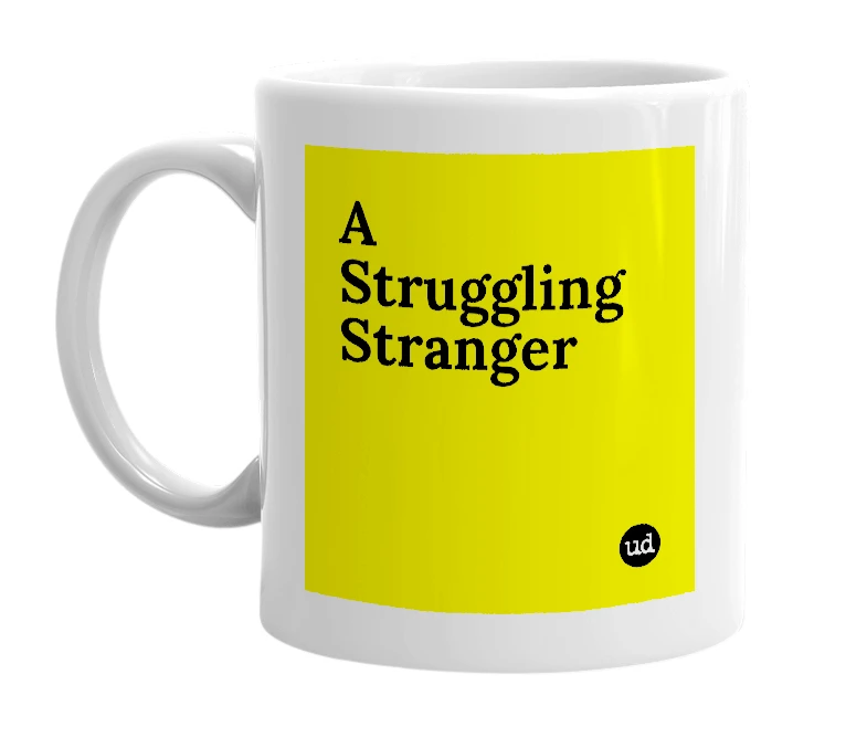 White mug with 'A Struggling Stranger' in bold black letters