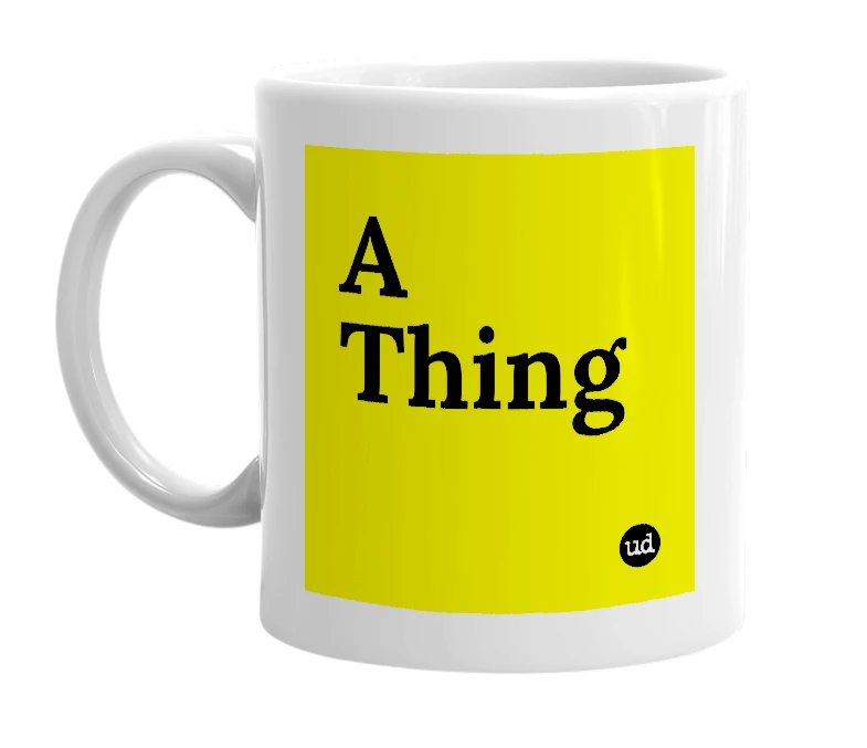 White mug with 'A Thing' in bold black letters