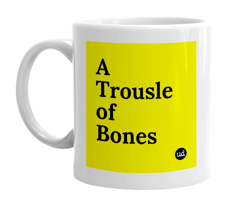 White mug with 'A Trousle of Bones' in bold black letters