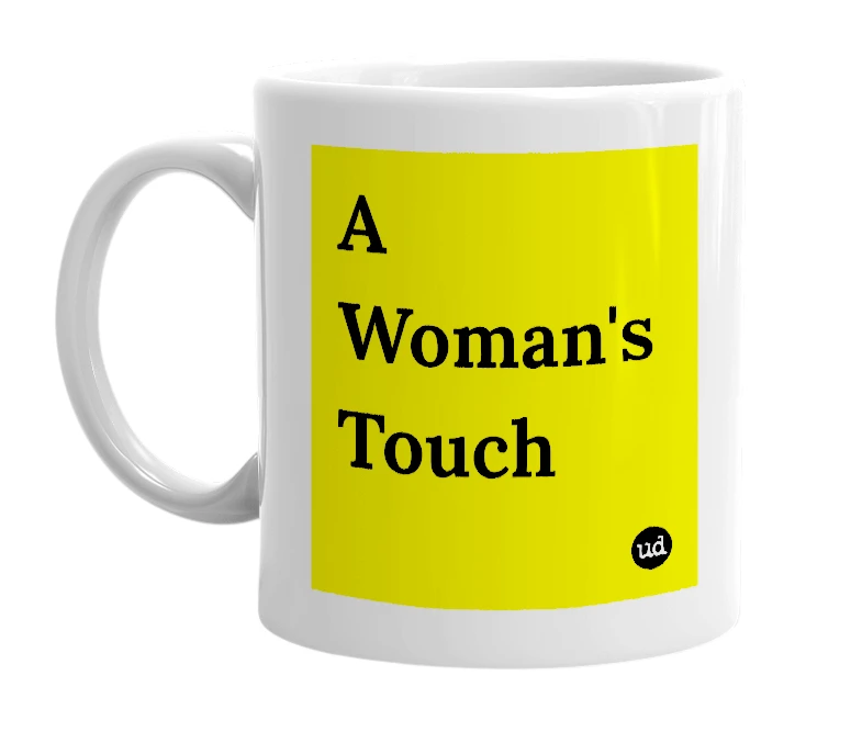 White mug with 'A Woman's Touch' in bold black letters