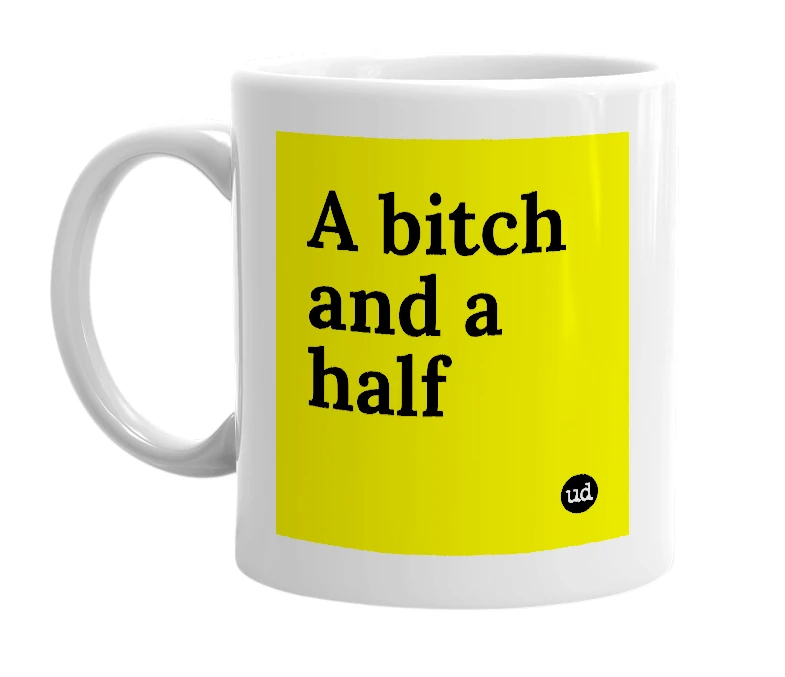 White mug with 'A bitch and a half' in bold black letters