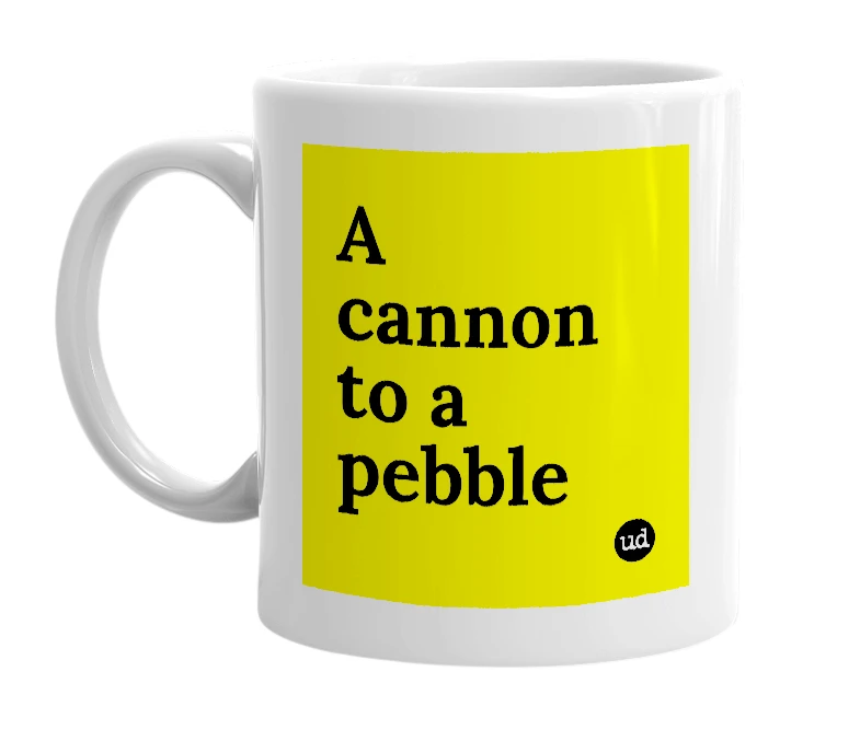 White mug with 'A cannon to a pebble' in bold black letters