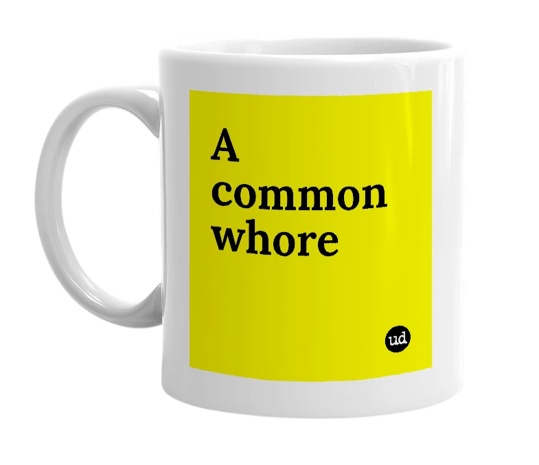 White mug with 'A common whore' in bold black letters