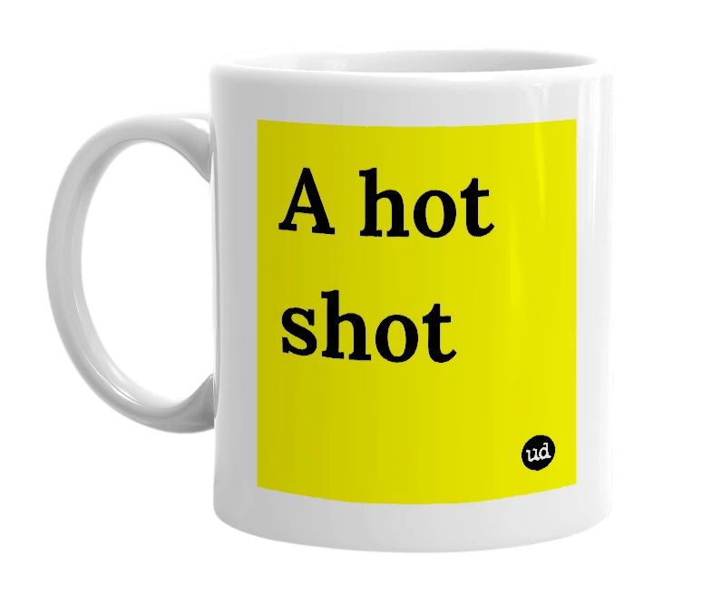 White mug with 'A hot shot' in bold black letters