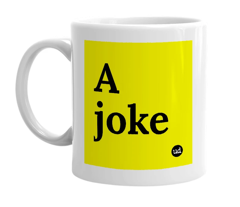 White mug with 'A joke' in bold black letters