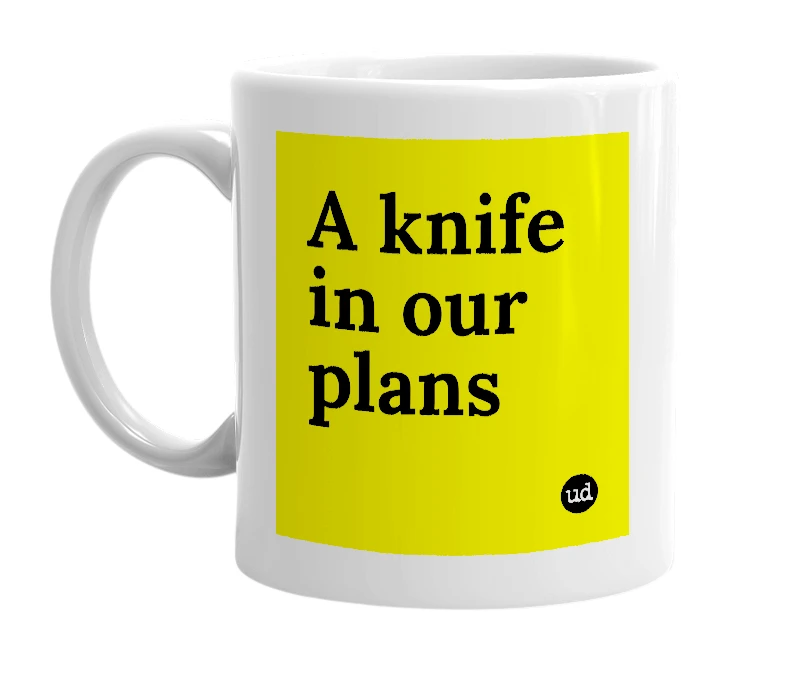 White mug with 'A knife in our plans' in bold black letters