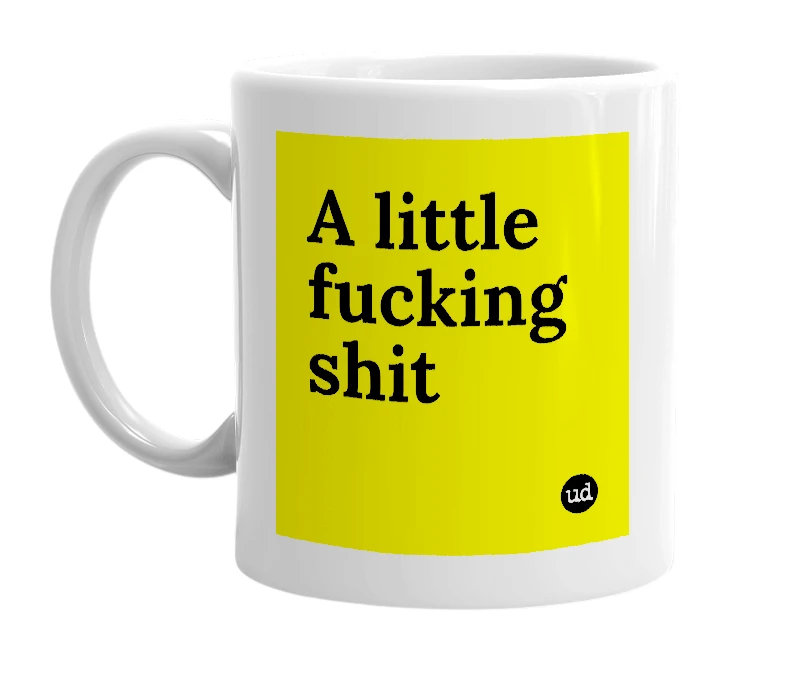 White mug with 'A little fucking shit' in bold black letters
