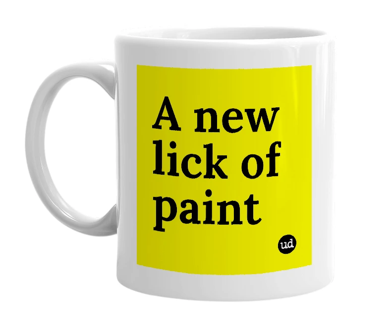 White mug with 'A new lick of paint' in bold black letters