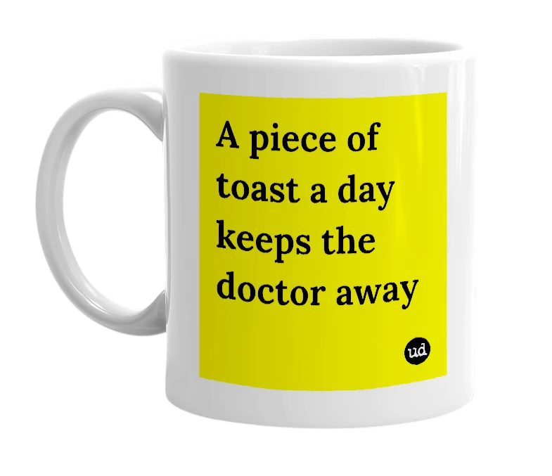 White mug with 'A piece of toast a day keeps the doctor away' in bold black letters