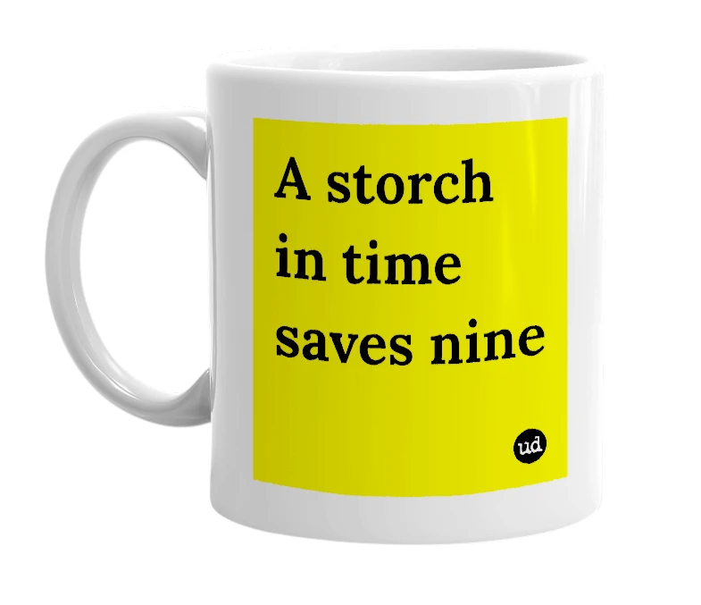 White mug with 'A storch in time saves nine' in bold black letters
