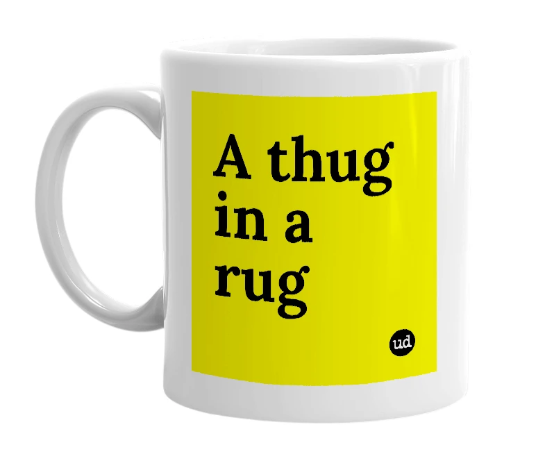 White mug with 'A thug in a rug' in bold black letters