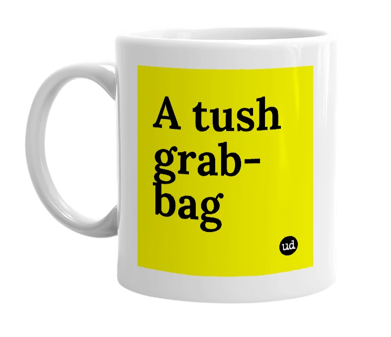 White mug with 'A tush grab-bag' in bold black letters