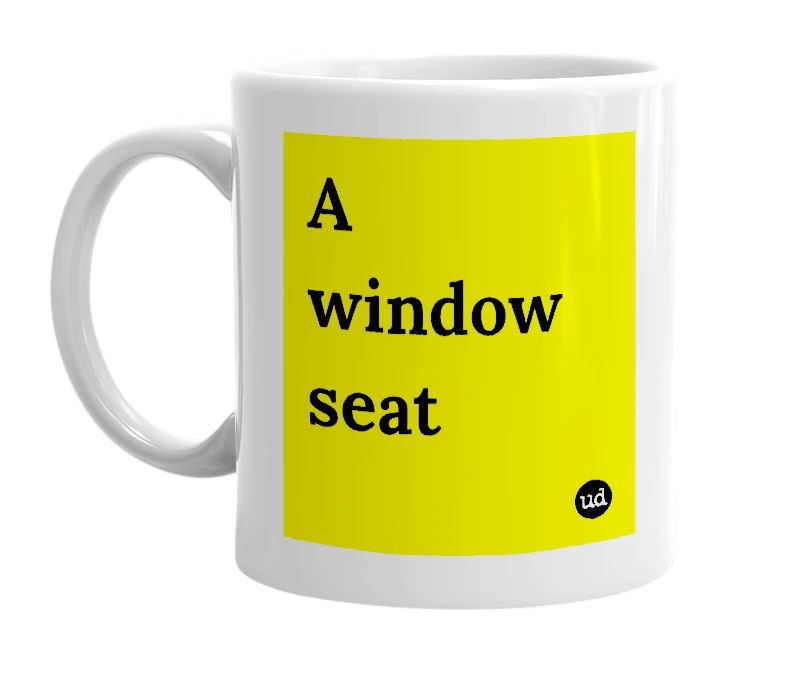 White mug with 'A window seat' in bold black letters