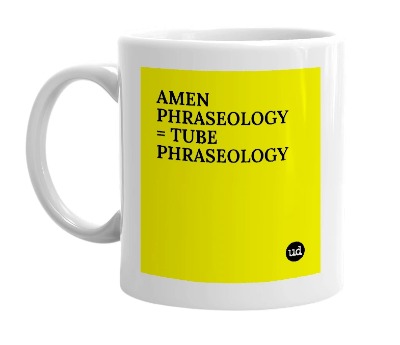 White mug with 'AMEN PHRASEOLOGY = TUBE PHRASEOLOGY' in bold black letters