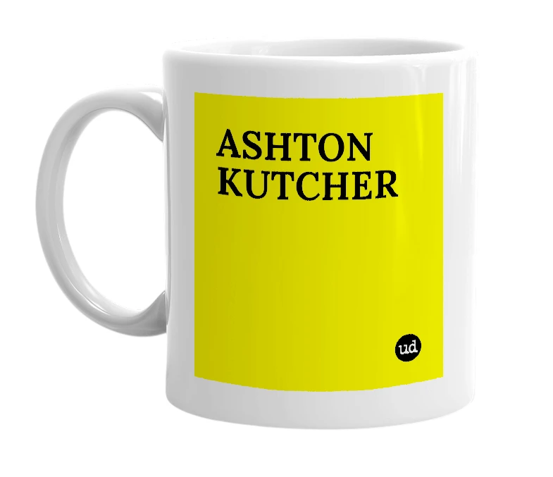 White mug with 'ASHTON KUTCHER' in bold black letters