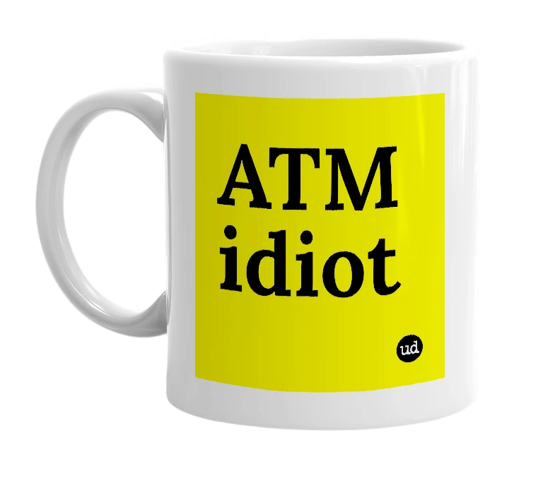 White mug with 'ATM idiot' in bold black letters