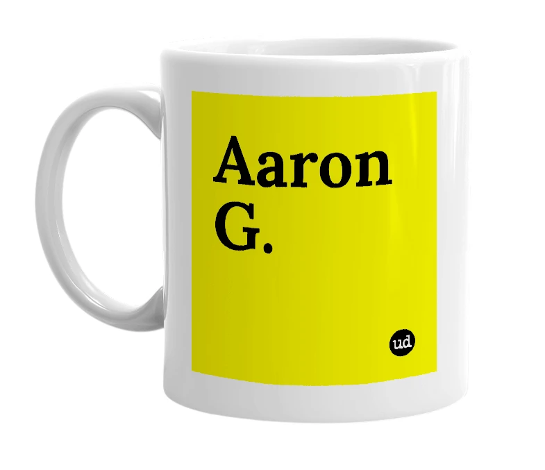 White mug with 'Aaron G.' in bold black letters