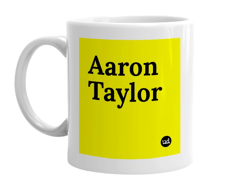 White mug with 'Aaron Taylor' in bold black letters