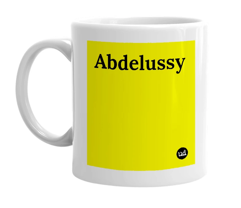 White mug with 'Abdelussy' in bold black letters